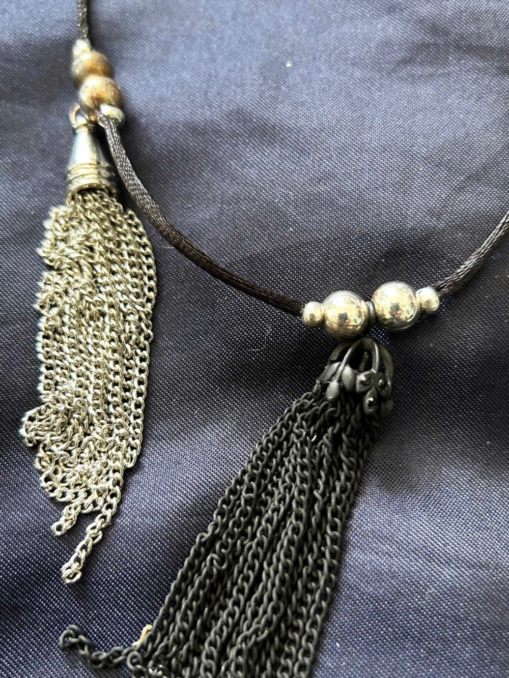 NECKLACE 2 METAL SILVER TONE TASSELS 1 METAL BLACK TASSEL WITH SILVER TONE BEADS